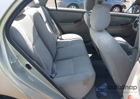 2004 Toyota Corolla Le z USA, uszkodzony, nr VIN JTDBR32E342046344